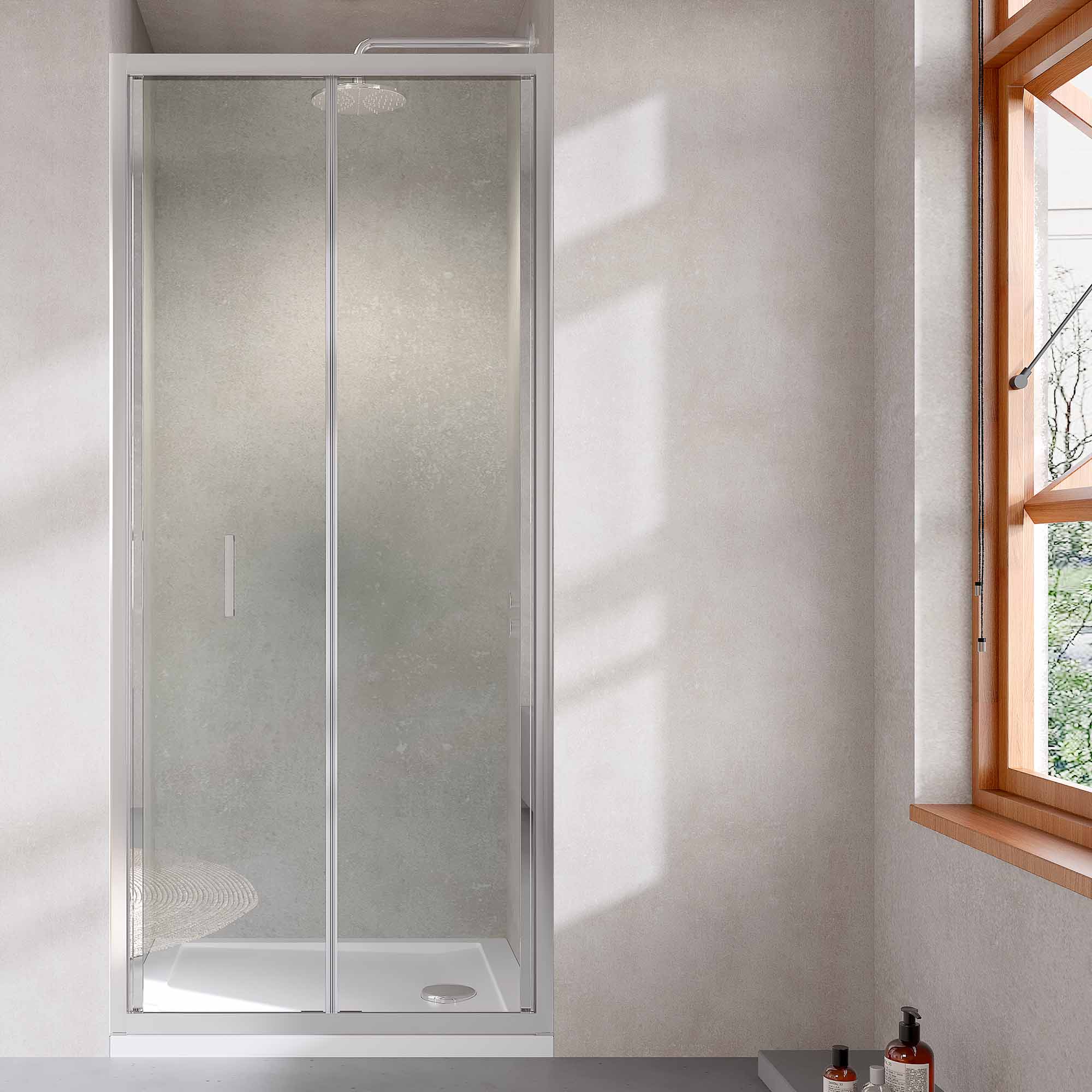 bifold shower door in recess chrome
