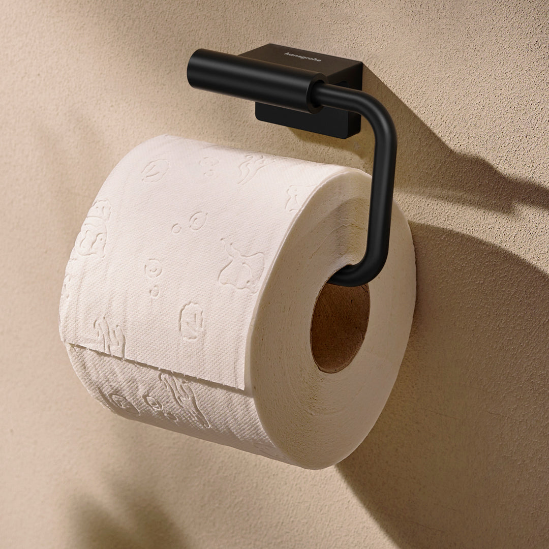 Photo of a toilet roll in the Hansgrohe AddStoris S Toilet Roll Holder, supplied by Deluxe Bathrooms.