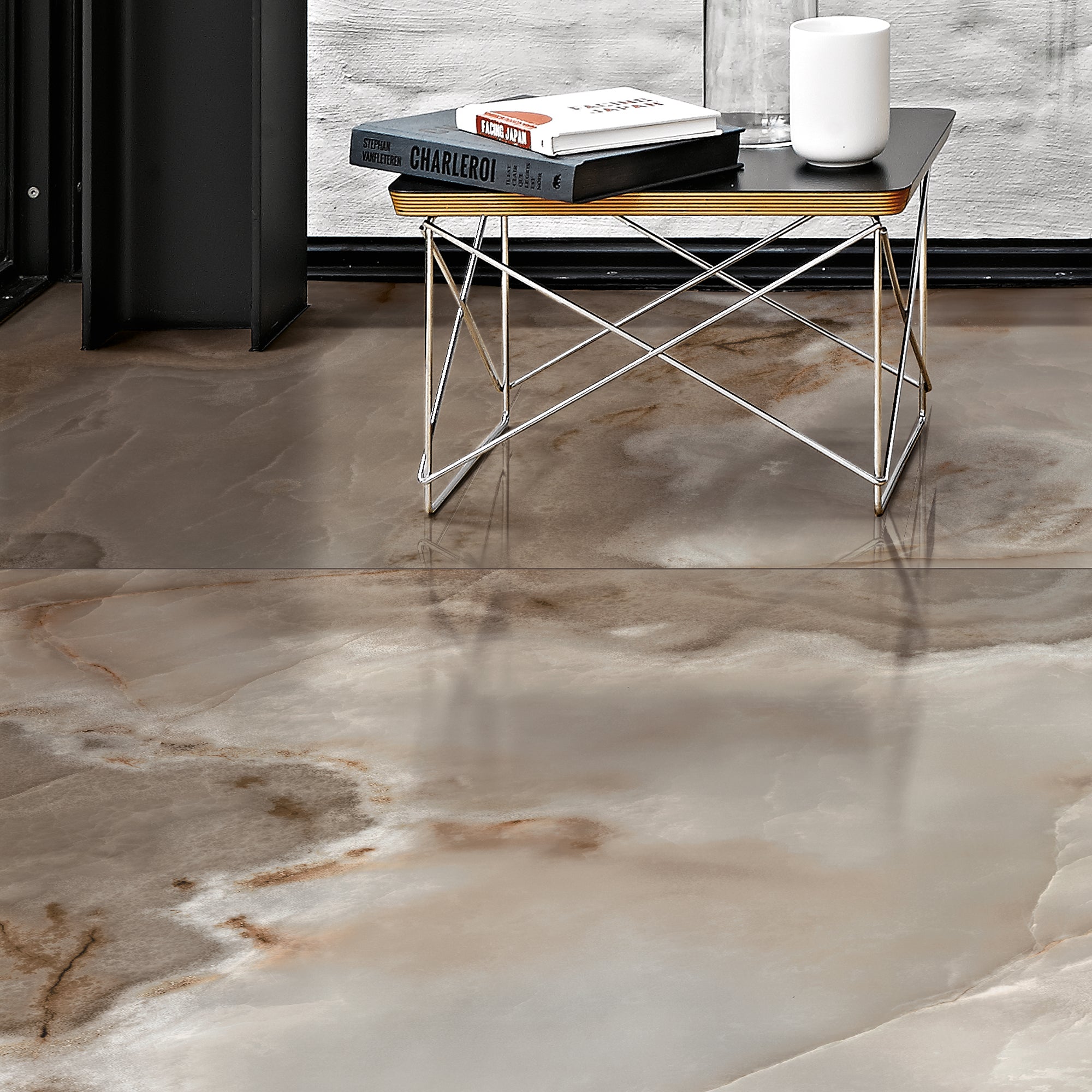 Lifestyle image of the Rêves Choco Onyx-effect porcelain tile, supplied by Deluxe Bathrooms.