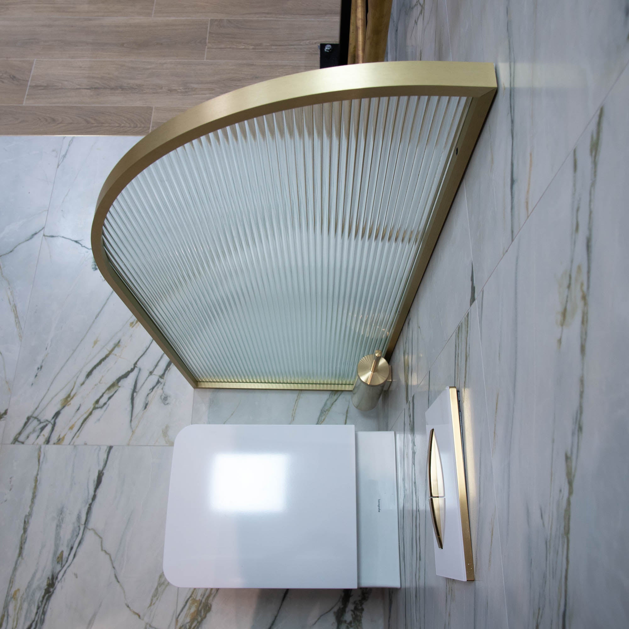 Granlusso Fluted Glass Framed Urinal Divider brushed brass